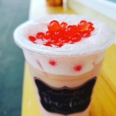 Strawberry milk tea with popping boba