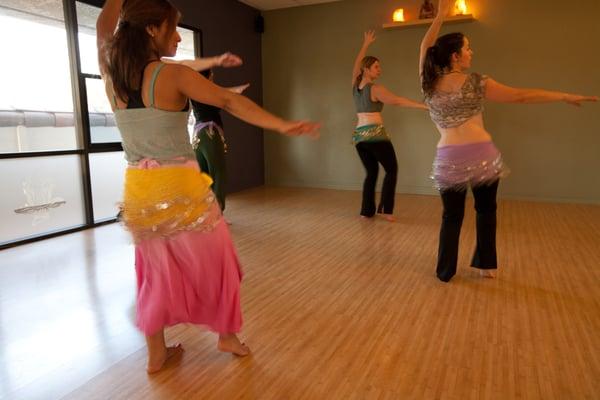 Belly Dancing!  A wonderful way to tone up, have fun and connect with your whole body.