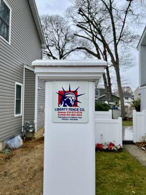 Our Sign of Excellence on a PVC fence post.