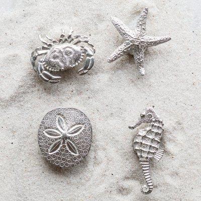 Remember your trip to the sea shore with these fun handcrafted pewter magnets.