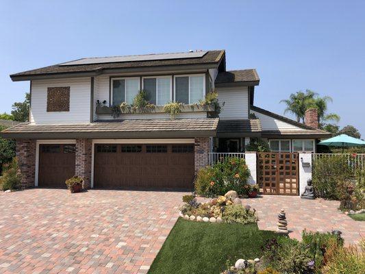 Look at this Castle!!! We installed new garage doors and custom built steel frame wood entry gates.