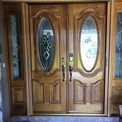 Wood grain finish on double retractable doors