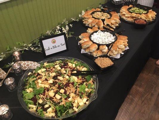 Part of the buffet table...broccoli salad and several chicken salad (sliders) options.