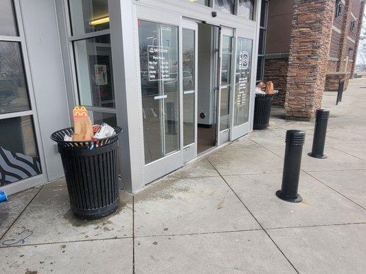 Garbage piled up at the entrance.