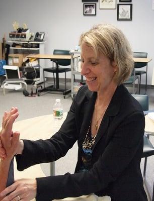 Michelle Blumenstyk, our Certified Hand Therapist, treating a patient