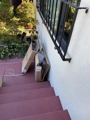 Boxes left on stairs.