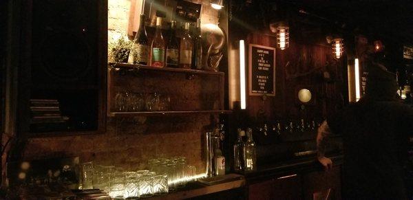 bar area and happy hour sign