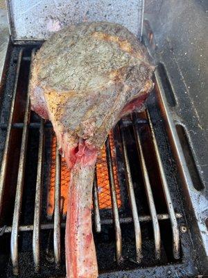 Searing the tomahawk.