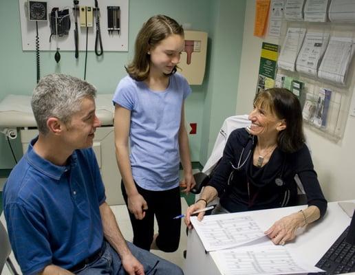 Dr. Lori Laffel, Chief of the Section on Pediatric, Adolescent and Young Adult Diabetes at Joslin, with a patient in the clinic