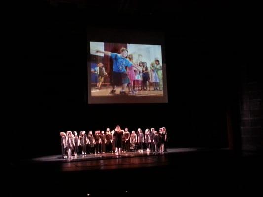 21st anniversary opening performance with children singing and a wonderful slideshow