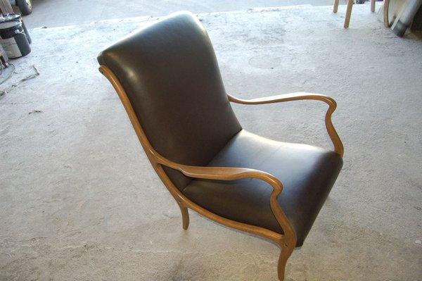 Leather upholstered chair with maple wood frame for Big Daddy's Antiques