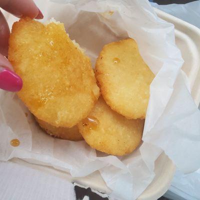 Nuégados (fried dumpling with a sweet sugar cane syrup).