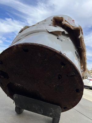 Hauling away leaking 100 gallon water heater