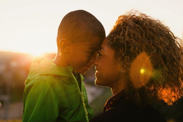 A happy family at sunset.