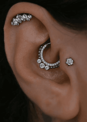 Ear Cartilage Piercing.  Free Jewelry with Initial Piercing.  Tattoo Shop Waikiki