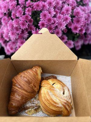 To go box. Almond Croissant, cardamom bun, and plain croissant