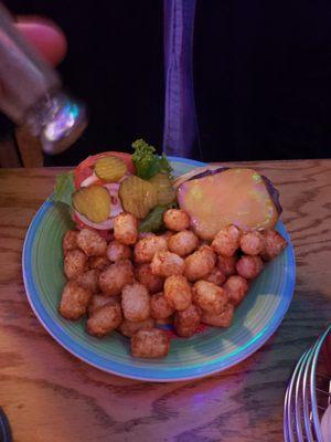 Homemade burger and tots.