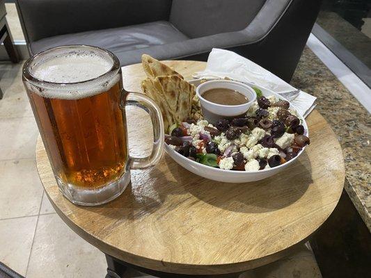 Greek salad and ice cold tap beer