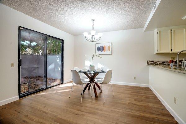 A bright dining area with glass doors extending to the patio, Mike Ramos, Realtor, San Jose - Silicon Valley - Santa Clara, Top 1% Real Esta