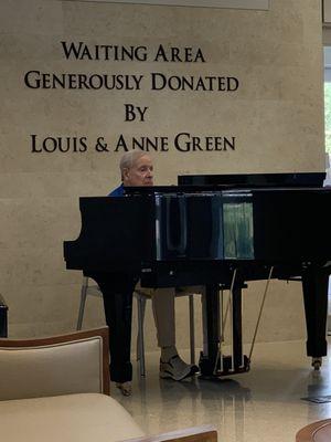 This is one of the long time volunteers at the hospital and he plays the piano in the waiting area every Monday.