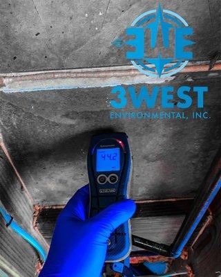 Elevated moisture readings during a mold clearance inspection.