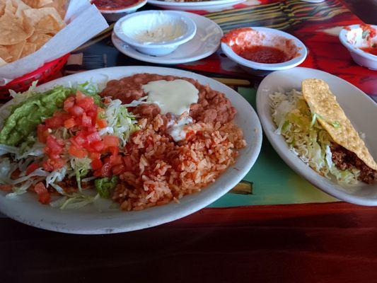 The pick 2 tostaquac, taco, rice and beans