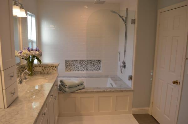 This is the completed master bath remodel. Mico, Hansgrohe, Toto, Panasonic, marble tub surround and vanity, rain shower.