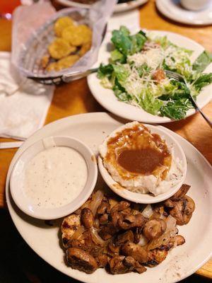 Smothered chicken (with gravy on the side + mashed potatoes) // Ceasar salad // fried pickles