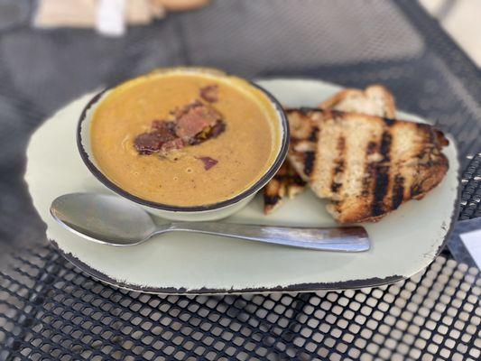 Soup special, butternut squash and green apple, with a side of grilled bread.