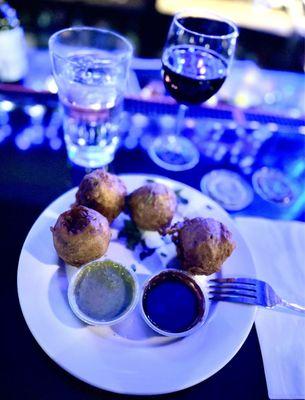 Batata Vada potato fritters with tamarind and sweet sauces!