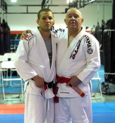 John Munoz - 3rd degree BJJ under Joe Moreira and Francisco Mansour - 9th degree Brazilian Jiu Jitsu Red Belt under Helio Gracie