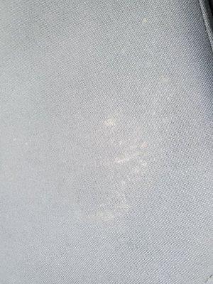 Stains on my seat that were supposed to be steamed cleaned. They didnt even try to wipe them cleam.