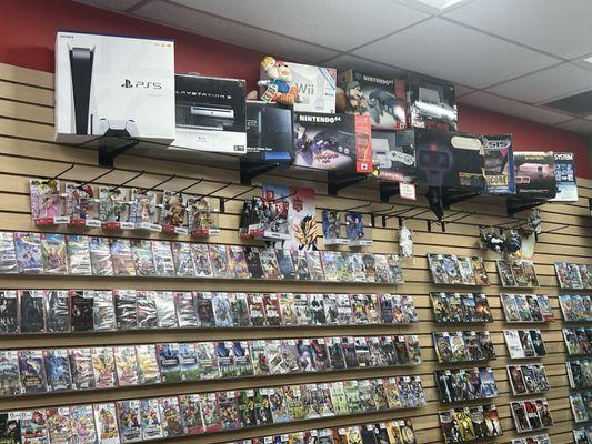 A vast collection of video game boxes spanning from the newest consoles to the NES