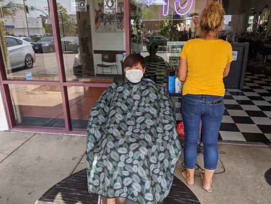 Outdoor haircuts in 100 degree heat with masks!