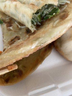 Thick green onion pancake. Good and chewy