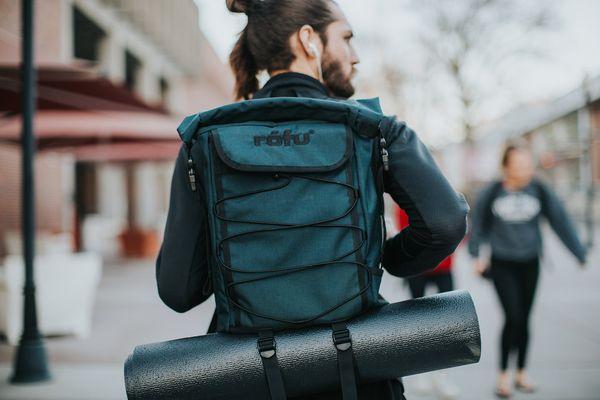 The Chico Rolltop Pro. Large, durable backpack with two functional pockets, interal organizers, front elastic shock cord, lower carry straps