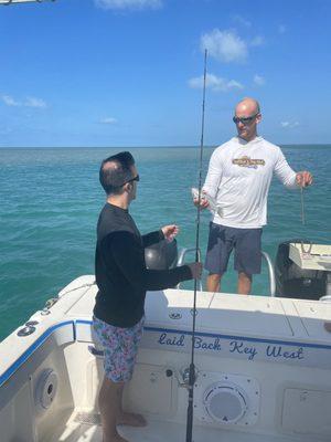 Captain Eric helping us with our catch