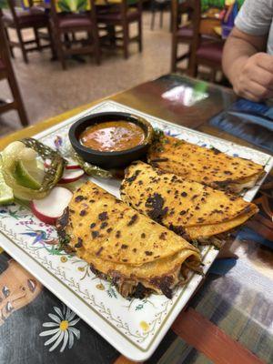 Tacos de birria.  Very good must eat hot