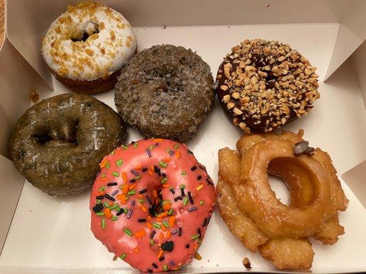 Pumpkin Spice, Blueberry Glazed, Blueberry Crumble, Chocolate with Peanuts, Pink Sprinkle, Old Fashioned Donut