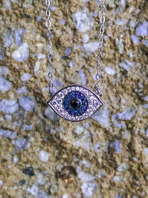 A memorizing all seeing eye diamond necklace made in our San Ramon studio.