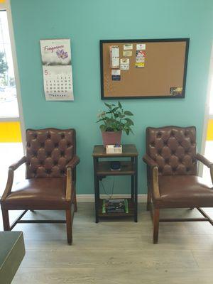 Lounge area w/ bulletin board.