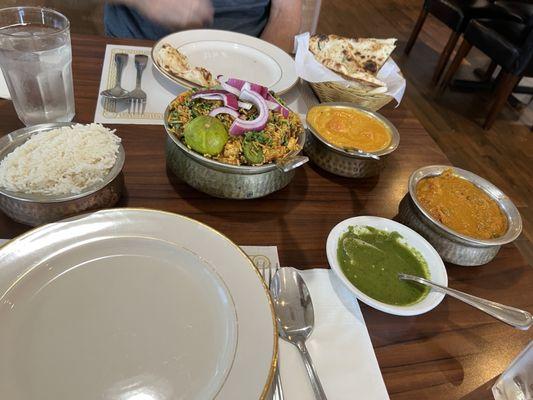 Amazing food! Garlic Naan, Navaratan Kurma, Chicken Tikka Masala and Paneer Biryani.