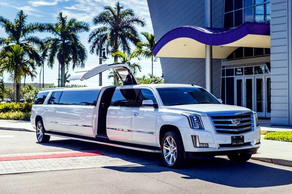 One-of-a-kind Cadillac Escalade stretch SUV limousine accommodates 20 passengers and will have you partying like a rock star.