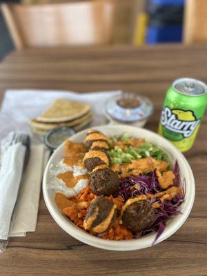 Big Greek Bowl w/ falafel and pita bread.