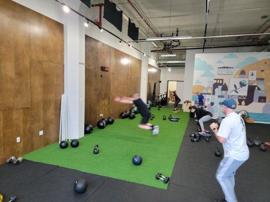 Member catching air on a broad jump