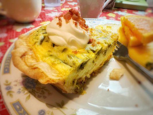 French quiche with asparagus and bacon topped with crème fraîche and fresh pineapple and oranges. Yummmm