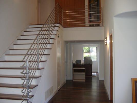 Modern wrought iron hand rail with powder coat finish