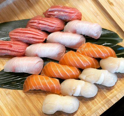 Toro, Yellowtail, Salmon, Scallop sushi