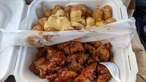 Loaded tater tots meal with Jamaican Jerk boneless wings $14+