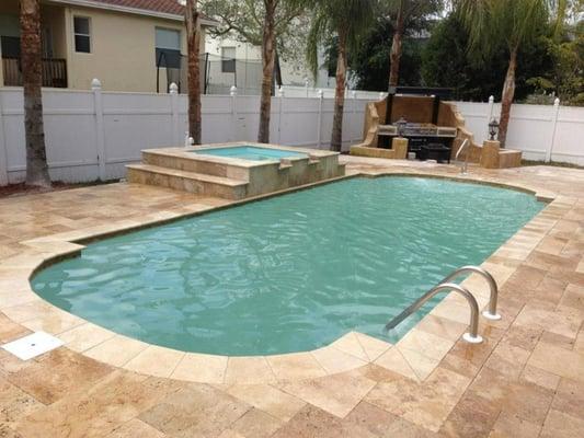 Roman 13x30 pool with an overflow spa 3'-6' deep